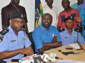 Police with fake doctor, Martins Ugwu Okpe